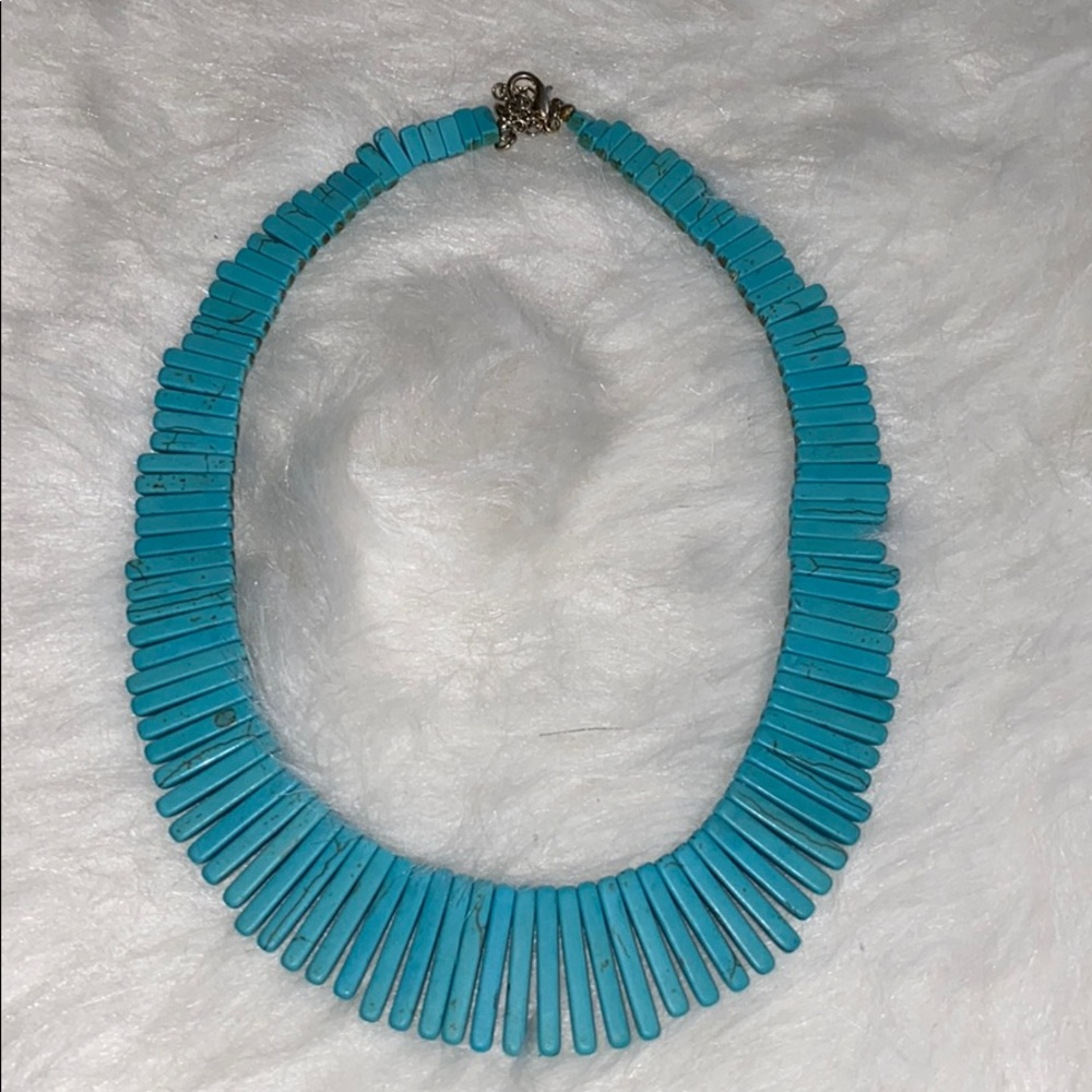 Turquoise plastic necklace with touch of brown